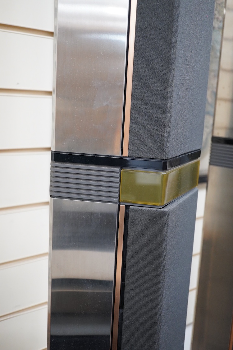 A Bang and Olufsen 6500 hi-fi system, comprising of a Beocord 6500, a Beogram CD 6500, a Beomaster 6500, and a master control panel, together with a pair of floor standing pedestal speakers, 164cm high, and pair of type